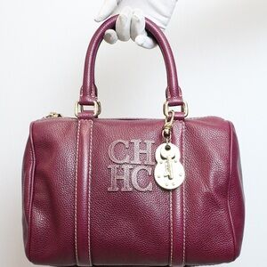 Carolina Herrera Andy Boston Wine Burgundy Pebbled Leather.